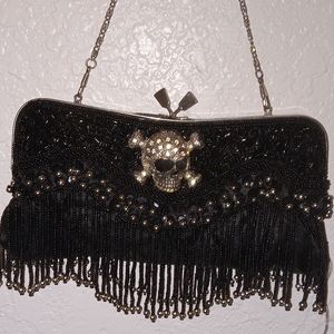 Skull am& sequins clutch